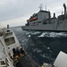 U.S. Coast Guard Cutter Bertholf conducts underway replenishment with the USNS Amelia Earhart in the East China Sea