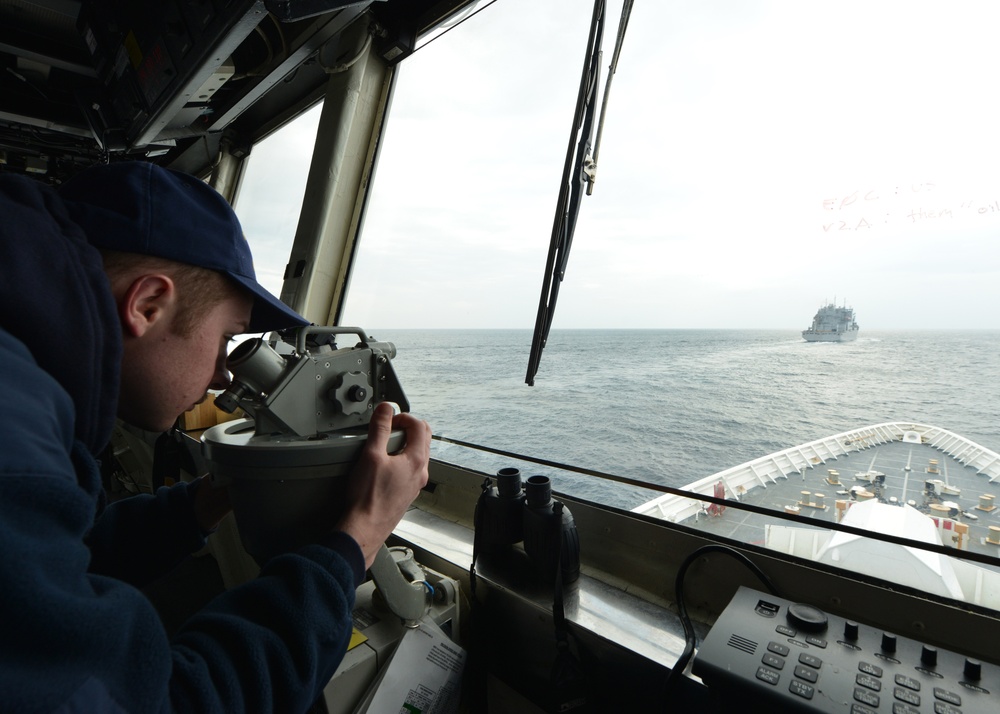 U.S. Coast Guard Cutter Bertholf conducts underway replenishment with the USNS Amelia Earhart in the East China Sea