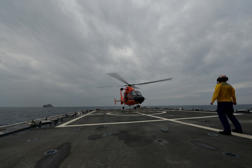 U.S. Coast Guard Cutter Bertholf conducts underway replenishment with the USNS Amelia Earhart in the East China Sea