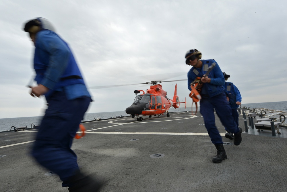 U.S. Coast Guard Cutter Bertholf conducts underway replenishment with the USNS Amelia Earhart in the East China Sea