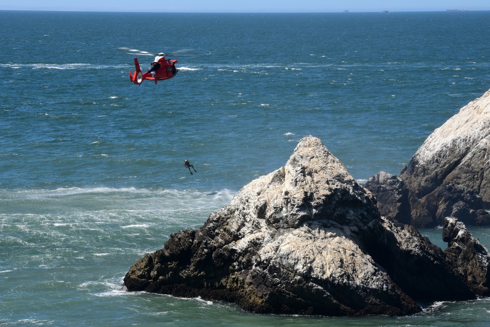 Coast Guard aircrews and boat crews conduct search-and-rescue demo