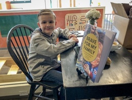 Military child writes book on coping with deployments, dad illustrates