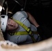 Airmen assigned to the 205th Engineering and Installation Squadron (205th EIS) at Will Rogers Air National Guard Base in Oklahoma City, install fiber optic cables underneath Wyoming Air National Guard Base in Cheyenne, Wyo.