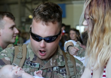 Wisconsin Guard rocket artillery unit reunites with families after deployment