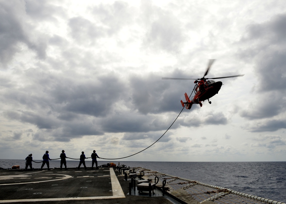 U.S. Coast Guard Cutter Bertholf crew conducts helicopter operations in the Philippine Sea