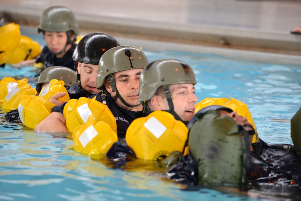 Coast Guard Port Security Unit 312 servicemembers conduct water survival training