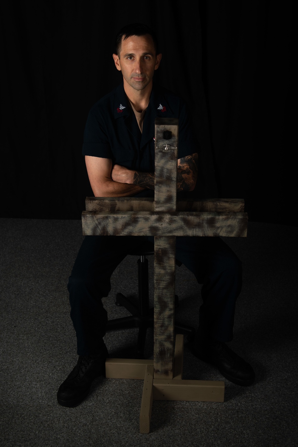 U.S. Navy Hospital Corpsman 1st Class Casey Phillips, from Peoria, Arizona, poses for a portrait