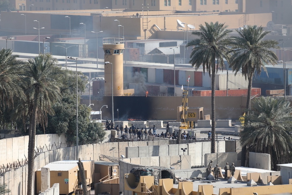 Assailants and attackers storm the U.S. Embassy Compound in Baghdad