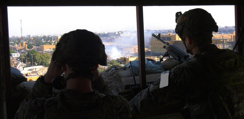 Soldiers Monitor U.S. Embassy in Iraq