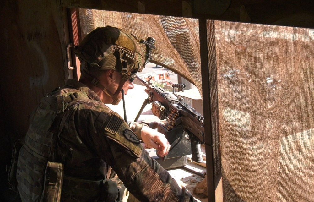 Army Soldiers Observe Crowds Near U.S. Embassy in Iraq