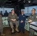 CO speaks with Marines and Sailor