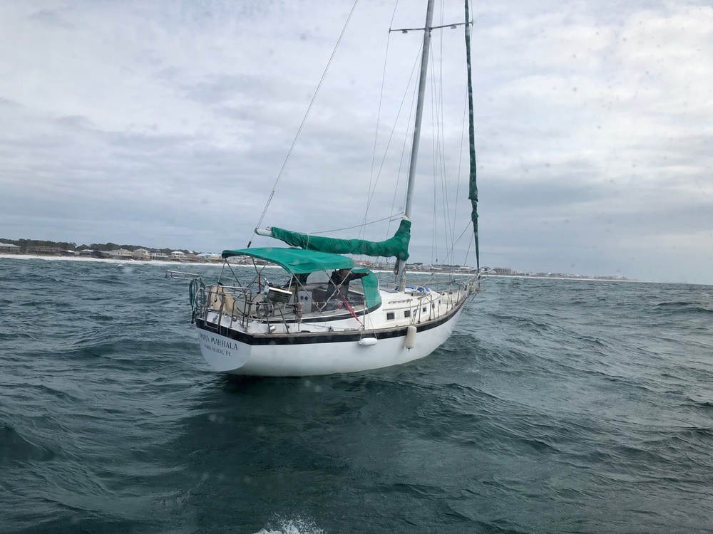 Coast Guard assists Man aboard Sailboat beset by weather