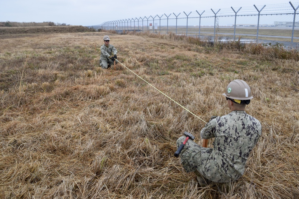 U.S. Navy Seabees deployed with NMCB-5’s Detail Iwakuni start a landfill capping project in support of Marine Corps Air Station Iwakuni