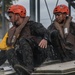 Assault Amphibian School students take a ride in the Submerged Vehicle Egress Trainer