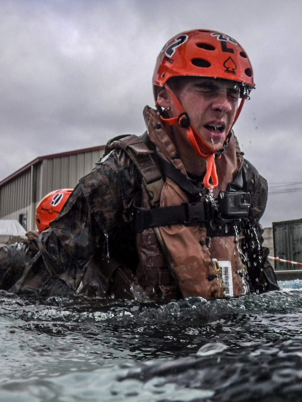 Assault Amphibian School students take a ride in the Submerged Vehicle Egress Trainer