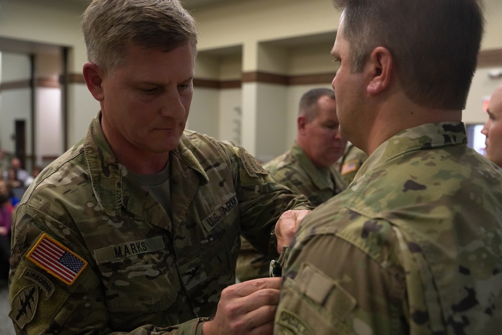 Col. Steven M. Marks, deputy commander 1st Special Forces Command (Airborne) awards a 2nd Battalion, 7th Special Forces Group (Airborne) for valor demonstrated while deployed in support of Operation Resolute Support