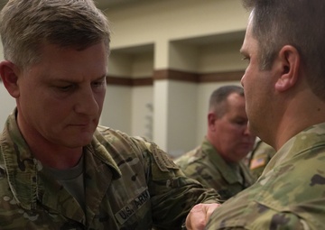 Col. Steven M. Marks, deputy commander 1st Special Forces Command (Airborne) awards a 2nd Battalion, 7th Special Forces Group (Airborne) for valor demonstrated while deployed in support of Operation Resolute Support