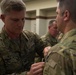 Col. Steven M. Marks, deputy commander 1st Special Forces Command (Airborne) awards a 2nd Battalion, 7th Special Forces Group (Airborne) for valor demonstrated while deployed in support of Operation Resolute Support