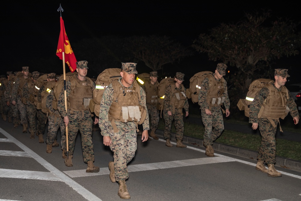 The Long Stretch | Marines with HQ Co., CLR-37, conduct a 5 kilometer hike