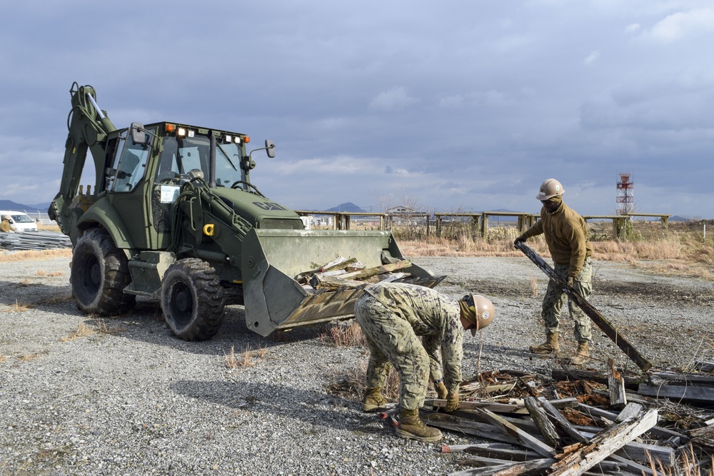 U.S. Navy Seabees with NMCB-5’s Detail Iwakuni construct a landfill capping project in support of Marine Corps Air Station Iwakuni