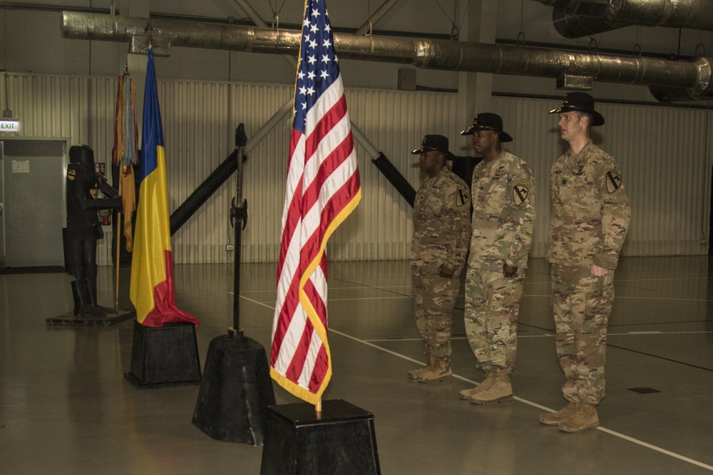 Soldiers of Able Company, 1-5 Cavalry, 2nd ABCT, 1st Cavalry Division along with Romanian soldiers conduct a change of command ceremony