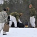 Cold-Weather Operations Course Class 20-01 students build Arctic tents during training at Fort McCoy