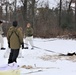 Cold-Weather Operations Course Class 20-01 students build Arctic tents during training at Fort McCoy