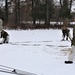 Cold-Weather Operations Course Class 20-01 students build Arctic tents during training at Fort McCoy