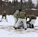 Cold-Weather Operations Course Class 20-01 students build Arctic tents during training at Fort McCoy