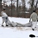 Cold-Weather Operations Course Class 20-01 students build Arctic tents during training at Fort McCoy