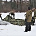Cold-Weather Operations Course Class 20-01 students build Arctic tents during training at Fort McCoy