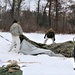 Cold-Weather Operations Course Class 20-01 students build Arctic tents during training at Fort McCoy