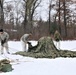 Cold-Weather Operations Course Class 20-01 students build Arctic tents during training at Fort McCoy