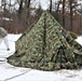 Cold-Weather Operations Course Class 20-01 students build Arctic tents during training at Fort McCoy