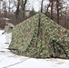 Cold-Weather Operations Course Class 20-01 students build Arctic tents during training at Fort McCoy