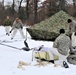 Cold-Weather Operations Course Class 20-01 students build Arctic tents during training at Fort McCoy