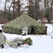 Cold-Weather Operations Course Class 20-01 students build Arctic tents during training at Fort McCoy