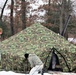 Cold-Weather Operations Course Class 20-01 students build Arctic tents during training at Fort McCoy