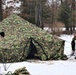 Cold-Weather Operations Course Class 20-01 students build Arctic tents during training at Fort McCoy