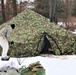 Cold-Weather Operations Course Class 20-01 students build Arctic tents during training at Fort McCoy