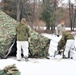 Cold-Weather Operations Course Class 20-01 students build Arctic tents during training at Fort McCoy