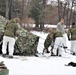 Cold-Weather Operations Course Class 20-01 students build Arctic tents during training at Fort McCoy