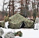 Cold-Weather Operations Course Class 20-01 students build Arctic tents during training at Fort McCoy