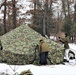 Cold-Weather Operations Course Class 20-01 students build Arctic tents during training at Fort McCoy
