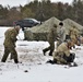 Cold-Weather Operations Course Class 20-01 students build Arctic tents during training at Fort McCoy