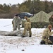 Cold-Weather Operations Course Class 20-01 students build Arctic tents during training at Fort McCoy