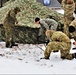Cold-Weather Operations Course Class 20-01 students build Arctic tents during training at Fort McCoy