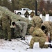 Cold-Weather Operations Course Class 20-01 students build Arctic tents during training at Fort McCoy
