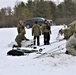 Cold-Weather Operations Course Class 20-01 students build Arctic tents during training at Fort McCoy
