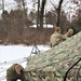 Cold-Weather Operations Course Class 20-01 students build Arctic tents during training at Fort McCoy